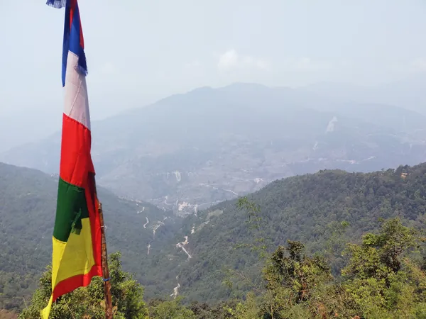 Prayer flag at the start of the trek